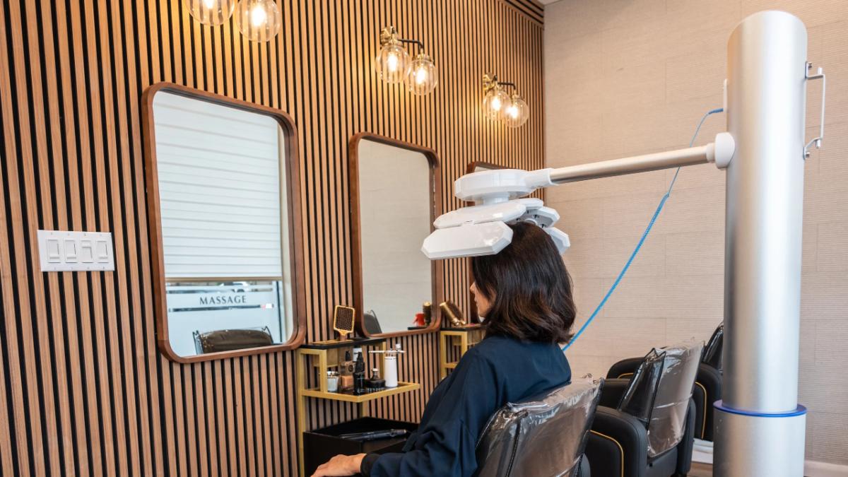 Head spa station with a scalp treatment in progress